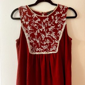Cream accented red blouse from Tempted Hearts.